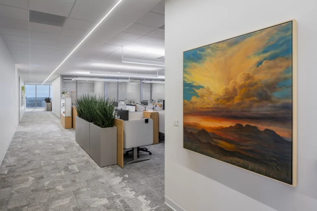 10-TIAA-Art-Package-Portfolio A framed landscape portrait in an office.