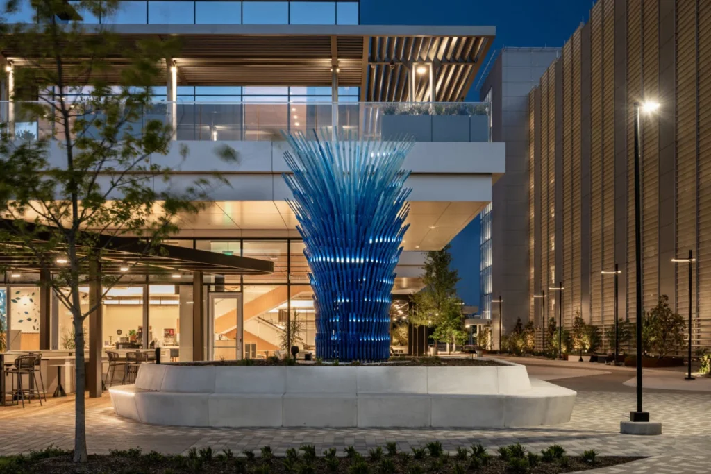 23-TIAA-Art-Package-Portfolio External office art sculpture at night.