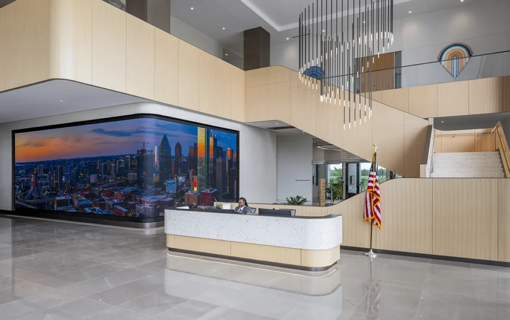 3-TIAA-Art-Package-Portfolio Office lobby with giant wraparound digital screen.