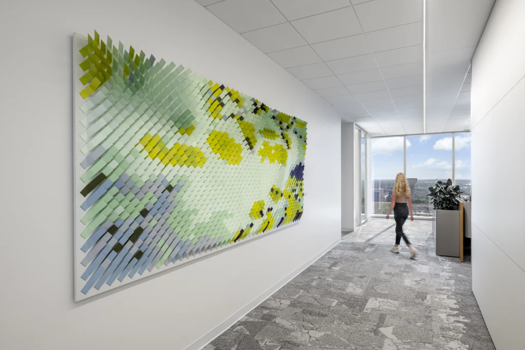 8-TIAA-Art-Package-Portfolio Artwork hanging in office corridor.