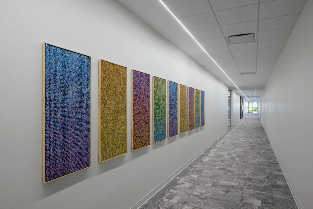 TIAA-Art-Package-Portfolio-2 Framed art in office corridor.