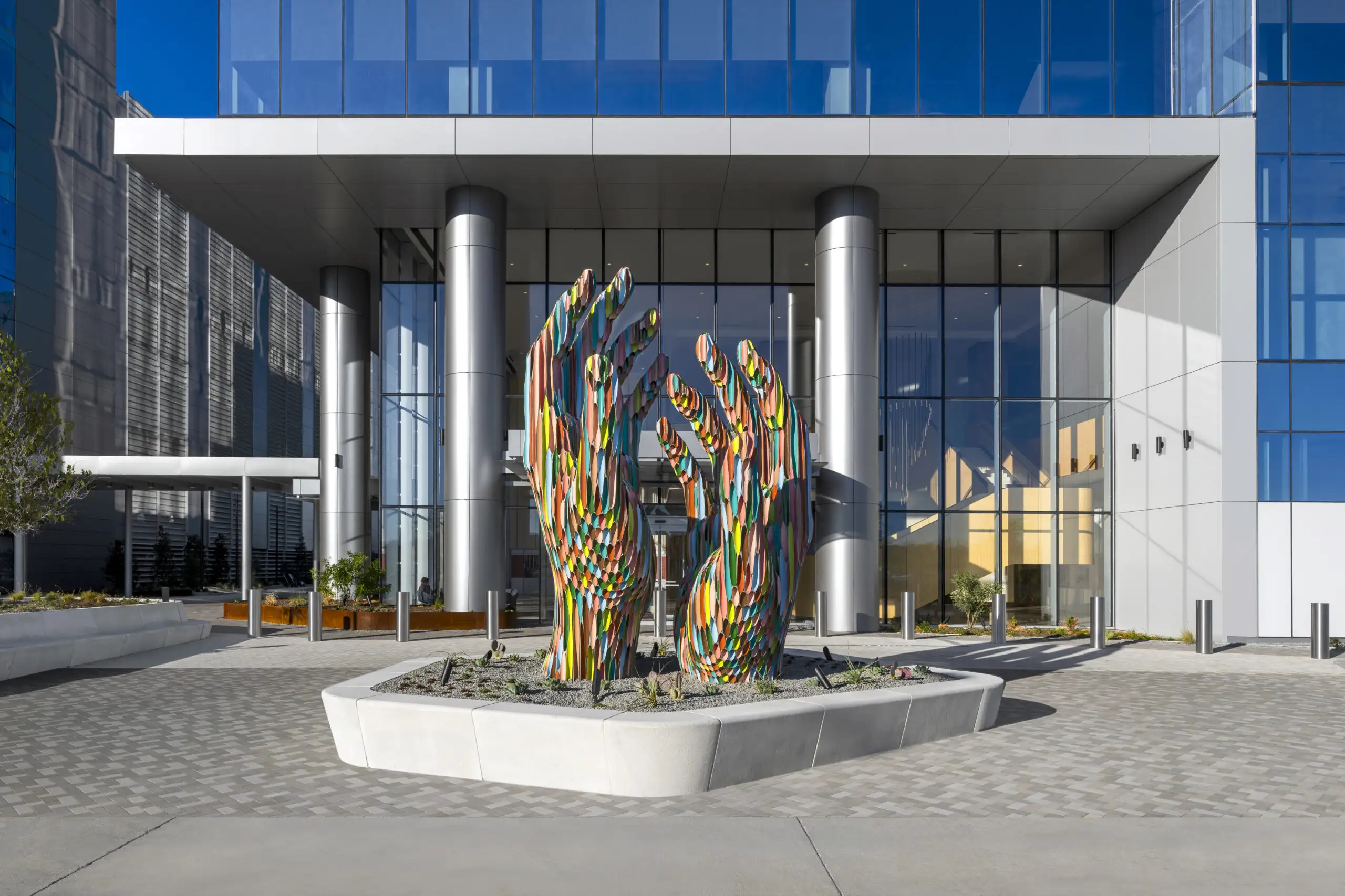 Art sculpture outside office tower.