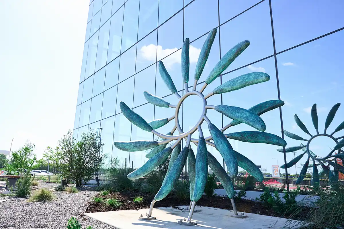 Steel sculpture of a giant walking flower provides experiential art