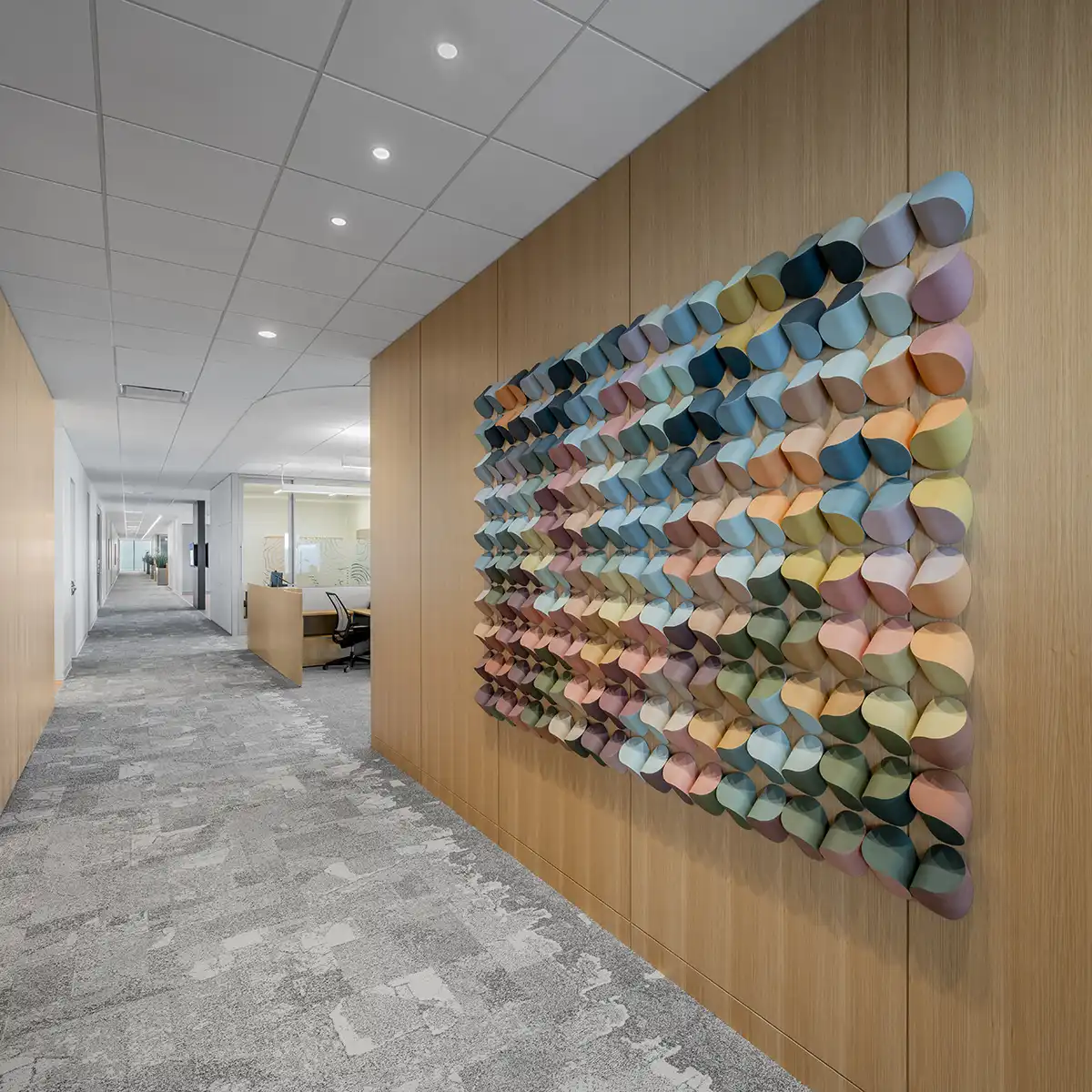 Colored porcelain artwork adds to workplace experience